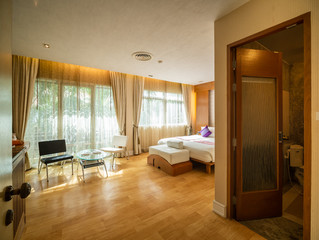 Luxury bedroom with warm light.