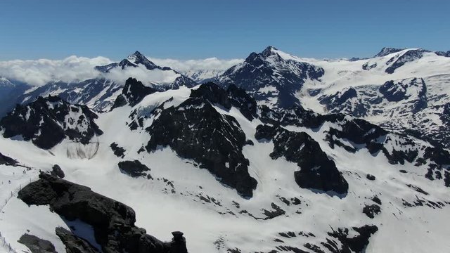 Drone view to the mountains around Titlis mountain in Switzerland. Shot was made in June.