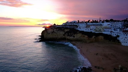 Aerial from the village Carvoeiro in Portugal at sunset