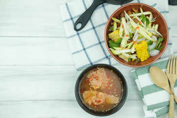 Spicy slice mango salad served with salmon