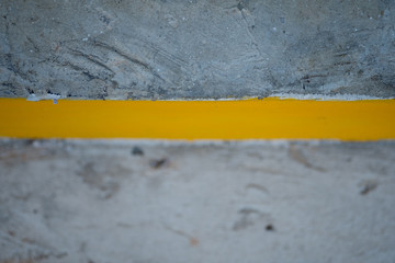 Yellow lines on cement road