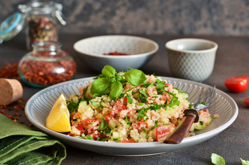 Tabule - a traditional oriental salad with vegetables, parsley and spices.