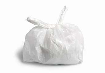 white plastic bag on white background. A White Plastic Bag Texture, macro, background. Reduction of plastic bags for natural treatment. The symbol of the campaign to refrain from using plastic bags.