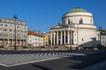 Fototapeta na wymiar Three Crosses Square and St Alexander Church in Warsaw