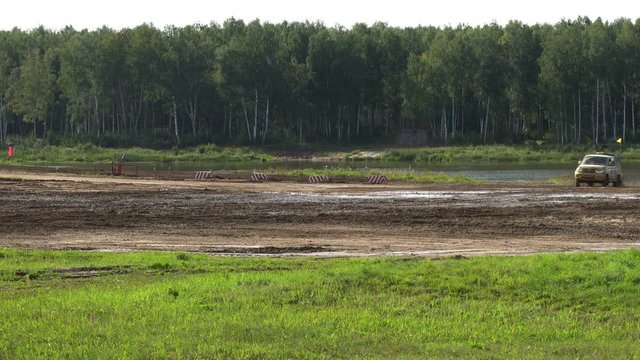 Competition in military jeeps at the training ground
