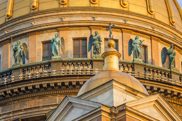 Sculptures of angels on the dome of St. Isaac's Cathedral in St. Petersburg