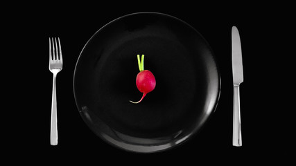 Top view of single radish on plate  vegetarian and diet concept harvest agriculture natural ingredient