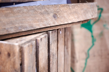 Two wooden boxes on a pile