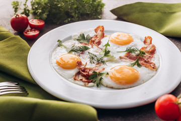 Perfect breakfast with bacon and eggs in the morning.