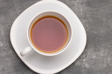 Cup of tea  on concrete stone background