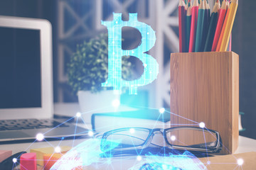 Crypto theme hologram with glasses on the table background. Concept of blockchain. Double exposure.