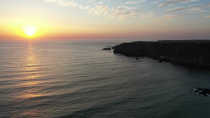 Aerial from Amado beach at sunset in Portugal