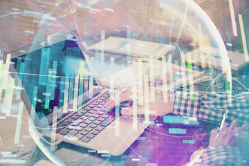 Multi exposure of businessman working on laptop on background. International business hologram in front. Concept of success.