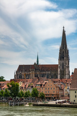 Fototapeta na wymiar Beautiful view of the Regensburg Cathedral ( St. Peter's Cathedral) on river side of Danube, Bavaria, Germany