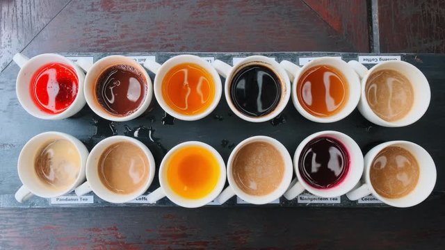 slow motion close up of colorful luwak coffee samples