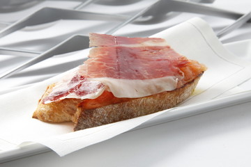 pincho  de jamón ibérico . Iberian ham skewer.