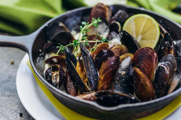 Baked Mediterranean mussels with creamy lime sauce.