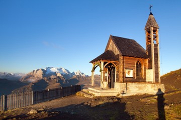 Fototapeta premium church or chapel on the mountain and Mount Marmolada