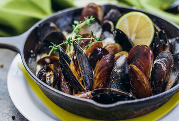 Baked Mediterranean mussels with creamy lime sauce.