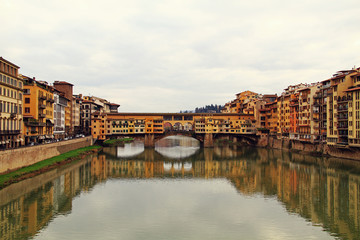 Fototapeta na wymiar Beautiful view on Florence street on the riverside