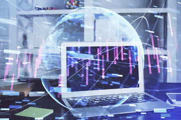 Financial chart drawing and table with computer on background. Multi exposure. Concept of international markets.