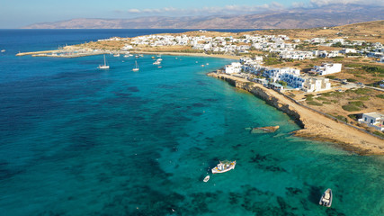 Naklejka premium Aerial drone photo of famous sandy turquoise beach of Ammos and main port of Koufonisi island, Small Cyclades, Greece