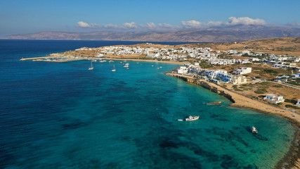 Naklejka na ściany i meble Aerial drone photo of famous sandy turquoise beach of Ammos and main port of Koufonisi island, Small Cyclades, Greece