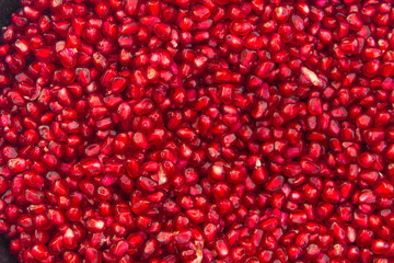 pomegranate background. red and fresh fruit background. red pomegranate seeds