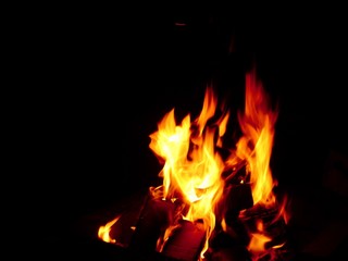 fire in fireplace by night