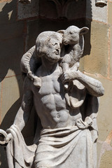 Jesus the Good Shepherd, statue on facade of the St James Church in Rothenburg ob der Tauber, Germany
