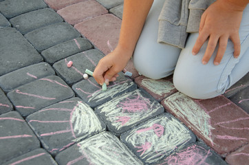 chalk drawings on asphalt