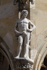 Obraz premium Adam, statue on facade of the St James Church in Rothenburg ob der Tauber, Germany