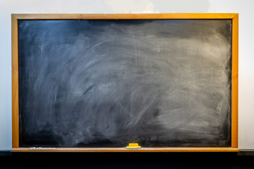 Chalk blackboard and rubber isolated background