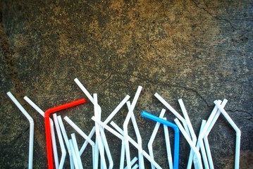 Straws on a cement background. Concept No Plastic Zero Waste plastic