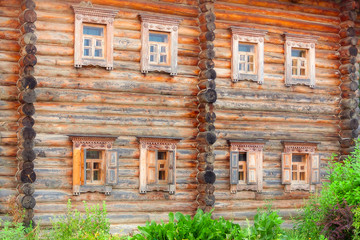 Old wooden two-story house in the village.