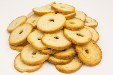 heap of crispy bread chips with sea salt seasoning
