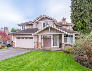 Houses in suburb at Summer in the north America. Luxury houses with nice landscape.