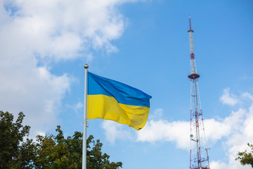 Flags on Lviv city background