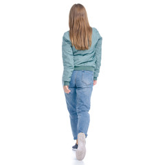 Woman in jeans coat jacket casual clothing walking goes smiling on white background isolation, rear view