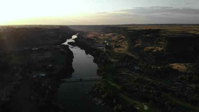 Aerial footage at sunset flying over Snake River Canyon in Twin Falls, Idaho, USA
