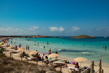 Fototapeta na wymiar beach with chairs and umbrellas formentera