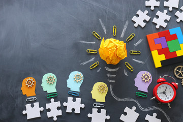 Education concept image. Creative idea and innovation. Crumpled paper as lightbulb metaphor over...