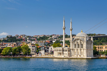 Fototapeta na wymiar Istanbul landscape. Istanbul's populer touristic destination Ortakoy Mosque view from bosphorus sea. Turkey