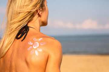 Sunscreen on the shoulder.