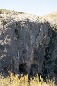 Beautiful alpine landscape, green mountain enviroment and blue sky in a sunny day