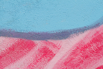 Pink and blue painted wall as background or texture