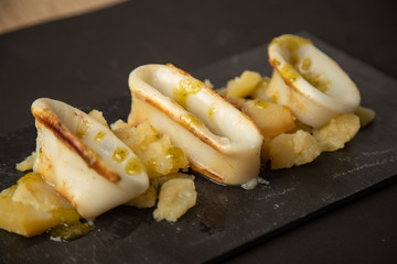 Spanish squid top with potatoes