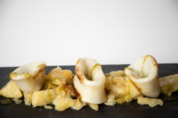 Spanish squid top with potatoes