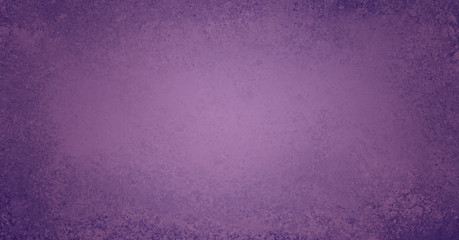 Grunge border on purple background with old distressed vintage texture design with soft light color purple center and dark borders in abstract wallpaper design that has copy space