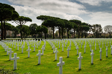 White crosses in American Cemetery. Sicily – Rome American Cemetery and Memorial in Nettuno Italy.